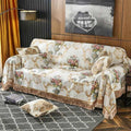 Copridivano beige con motivo floreale multicolore