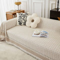 Copridivano beige a quadretti