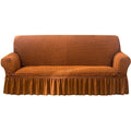 Copridivano terracotta con bordo a volant