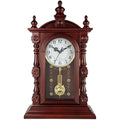 Orologio da tavolo marrone con pendolo